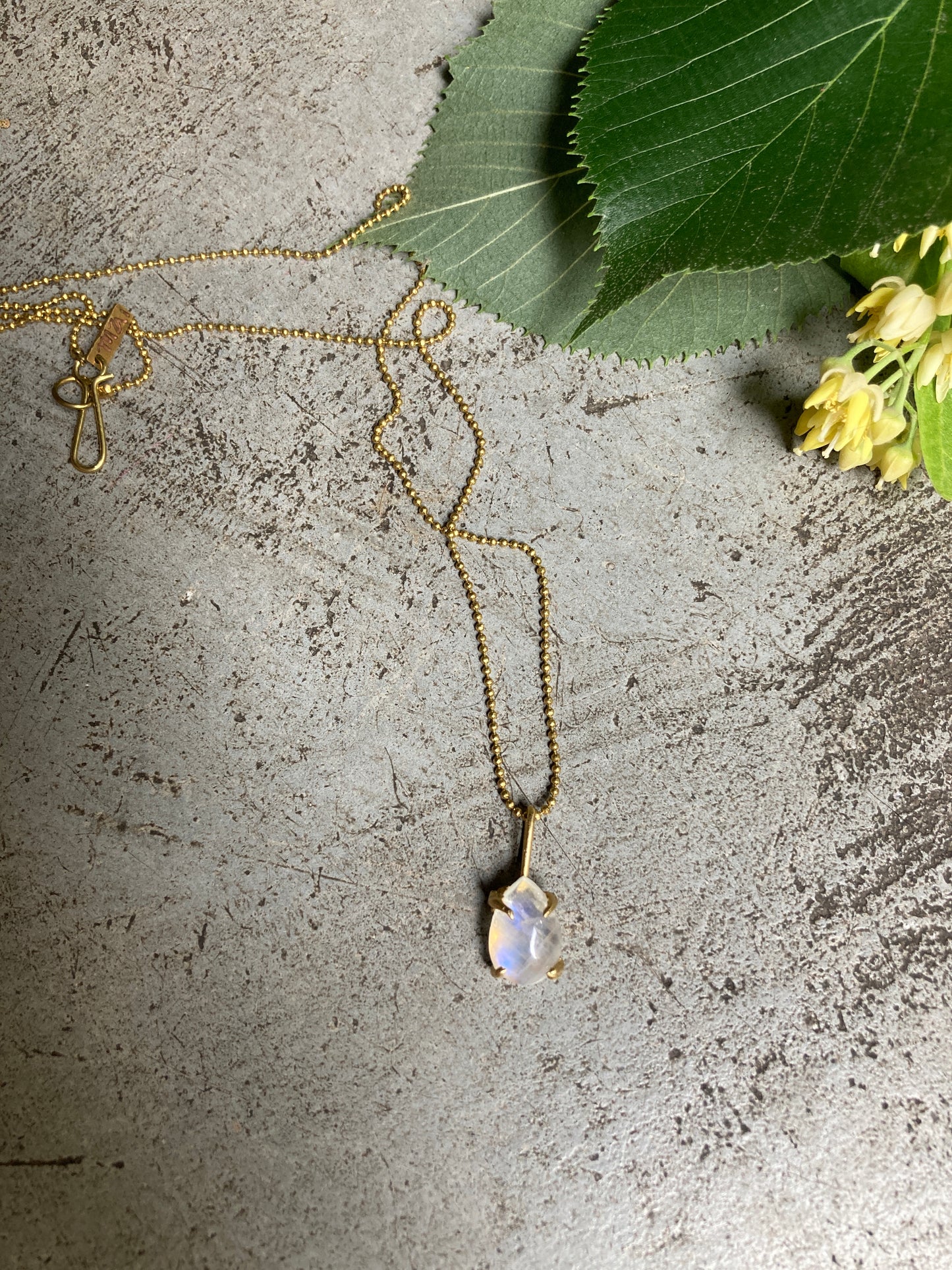 MOONSTONE DAINTY AMULET.