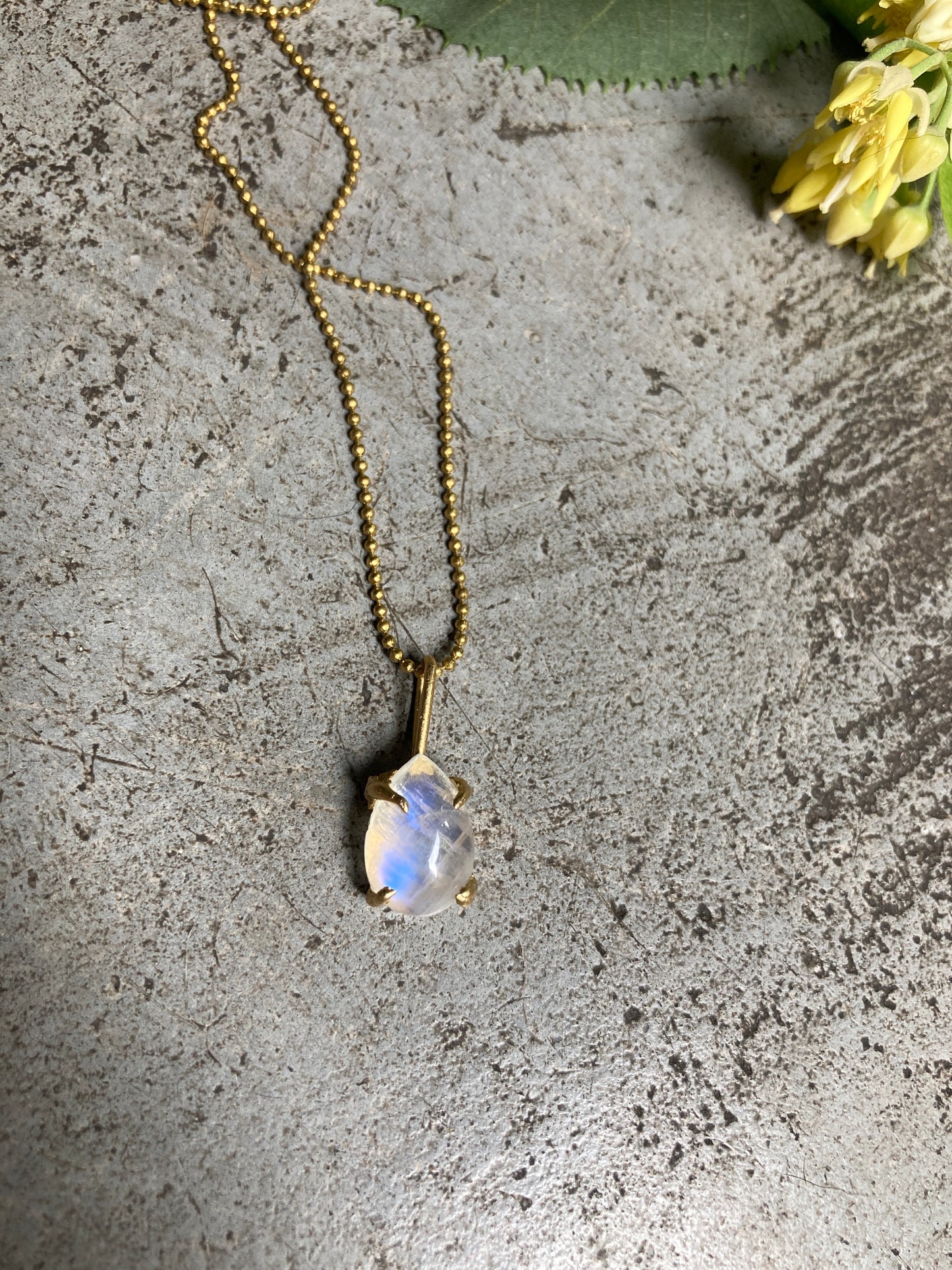 MOONSTONE DAINTY AMULET.