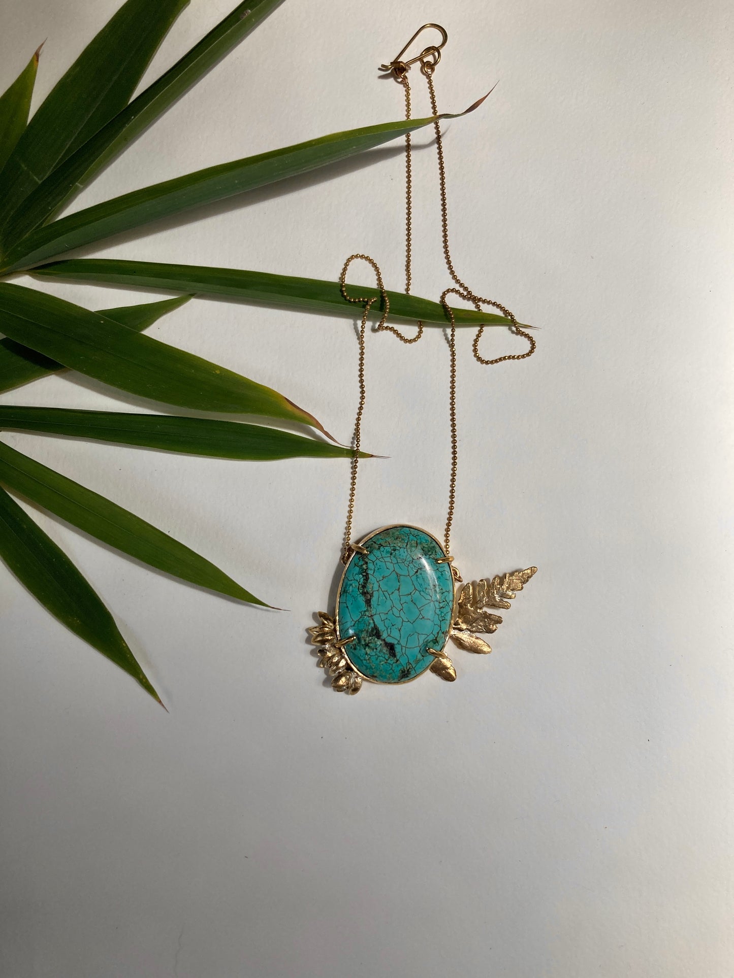 REAL BIG TURQUOISE NECKLACE WITH BOTANICAL GRIMPS.