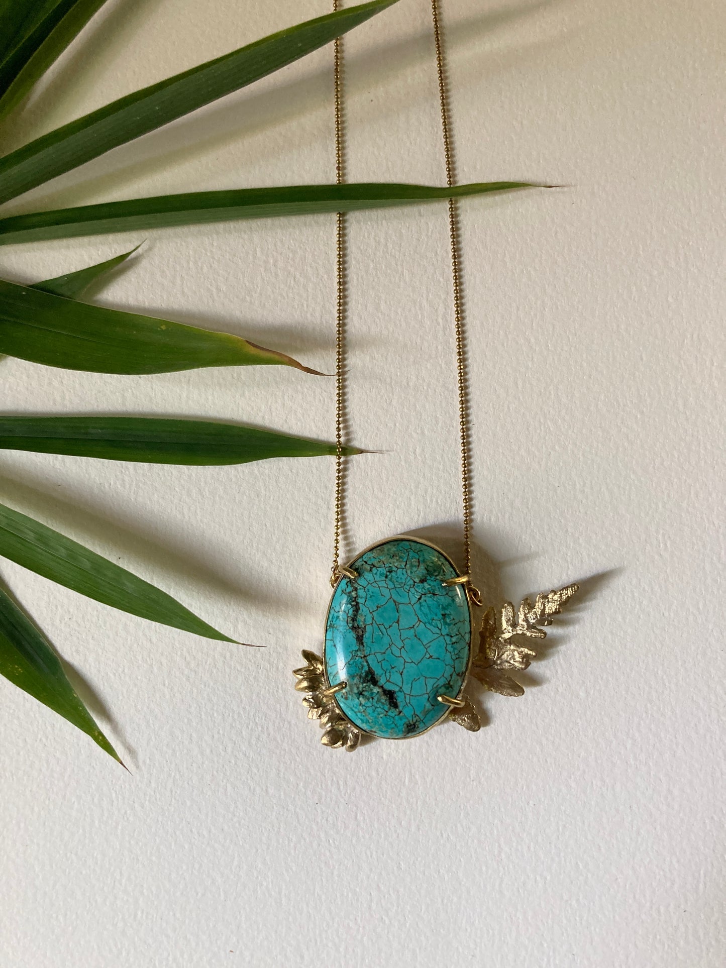 REAL BIG TURQUOISE NECKLACE WITH BOTANICAL GRIMPS.