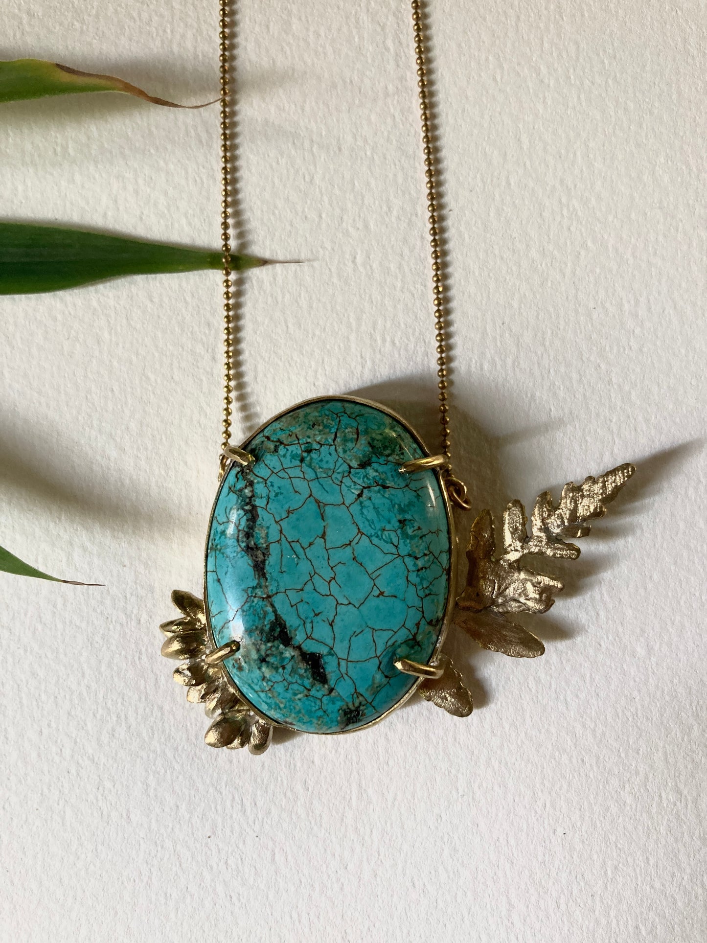 REAL BIG TURQUOISE NECKLACE WITH BOTANICAL GRIMPS.